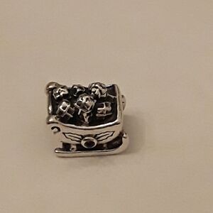 Pandora retired Santa's Sleigh with Garnet stones  925 ALE